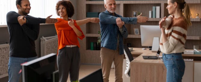 colleagues-office-stretching-work-day